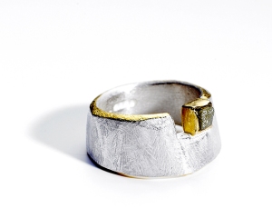 Great example of a rough diamond integrated into a unique design. Ring and photo from tanja-ufer.co.uk.